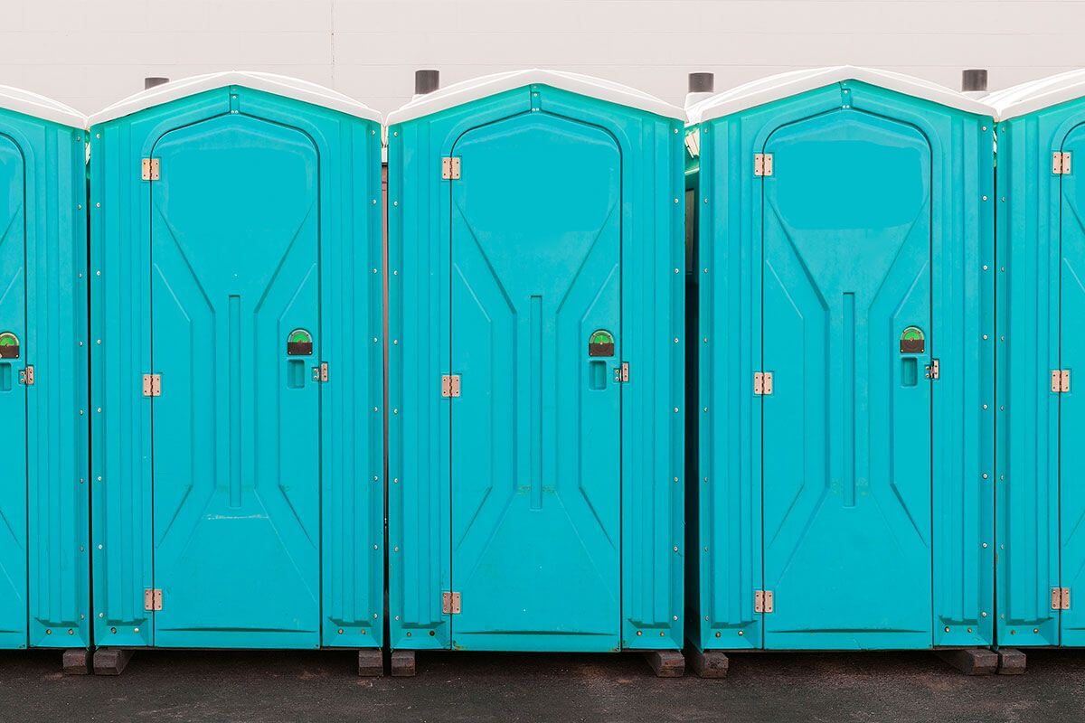 Industrial portable restroom units at a plant in Lemon Grove, California
